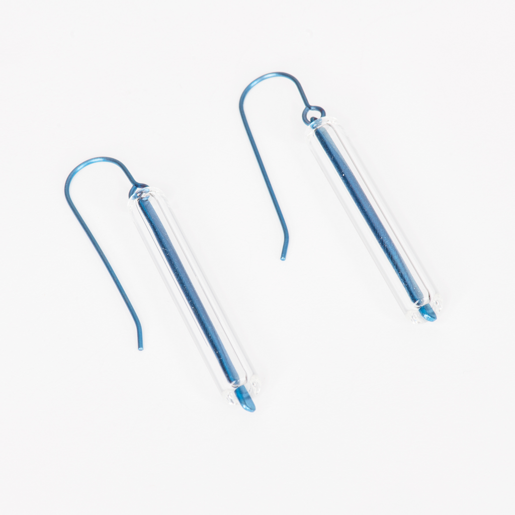 Dangle Earrings featuring glass tubes over blue titanium wire hooks.
