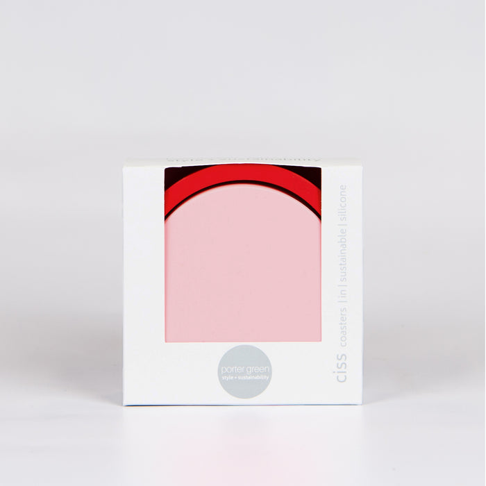 Round pink coasters and a red base in a white box reading 'Porter Green'.