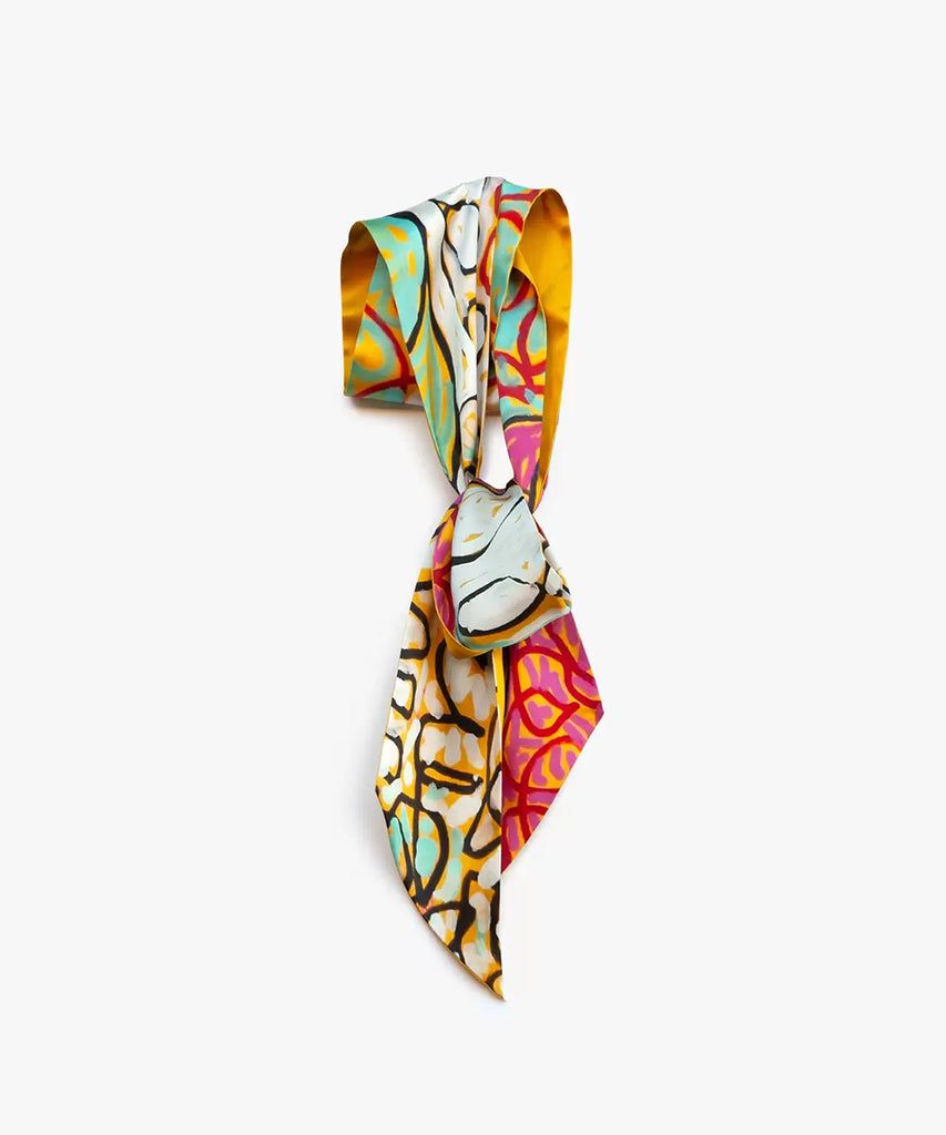 Silk scarf with vibrant swirly rainbow print