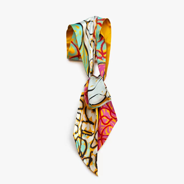 Silk scarf with vibrant swirly rainbow print
