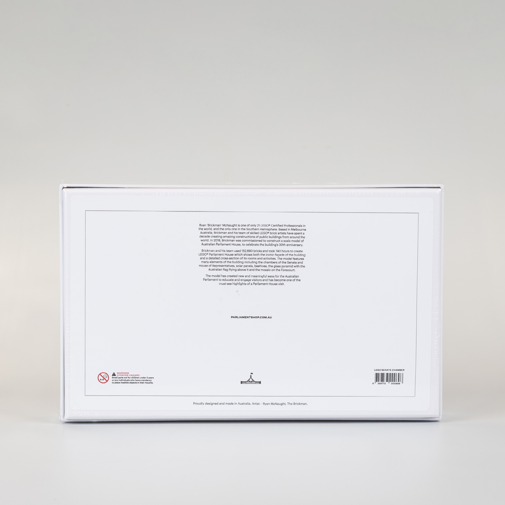 back cover of a white jigsaw puzzle box featuring a lego version of the senate chamber