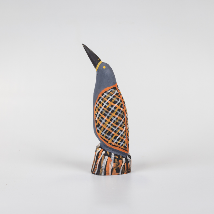small blue wooden bird sculpture