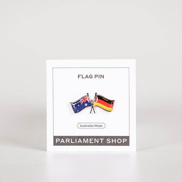 Lapel pin of Australia and Germany flags on white backing card