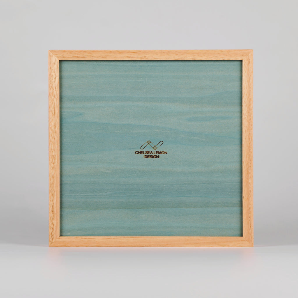 Back of Timber tray with wood burned 'chelsea lemon design' logo