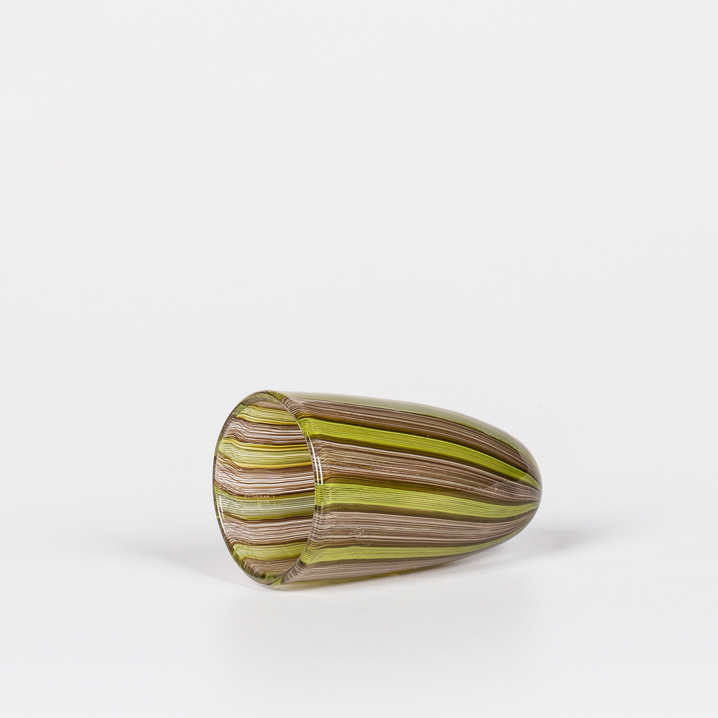 Miniature rounded glass vessel with intricate green and brown swirl design