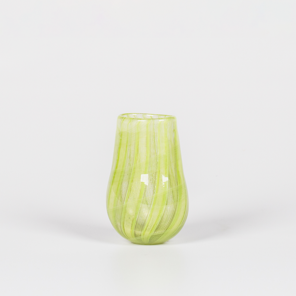 Miniature rounded glass vessel with intricate neon green swirl design