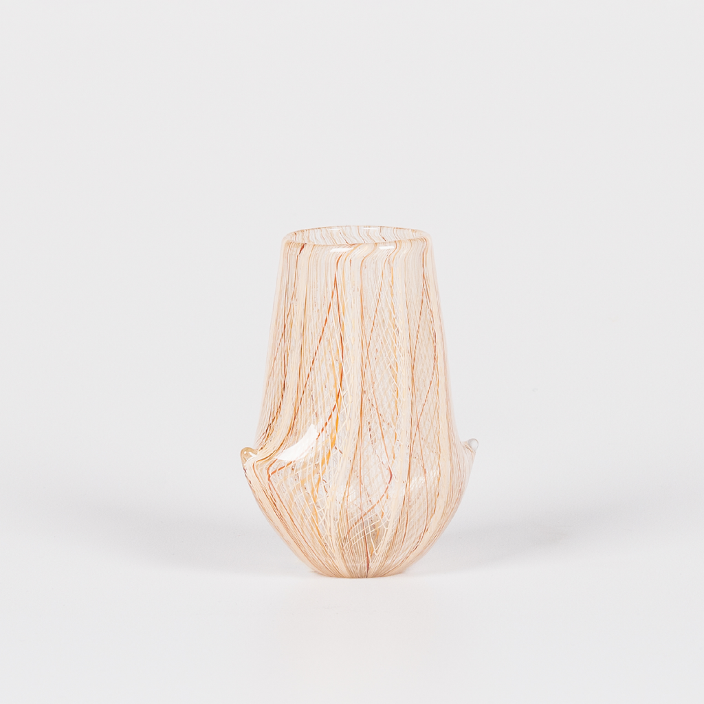 Miniature glass vessel with intricate brown and orange swirl design