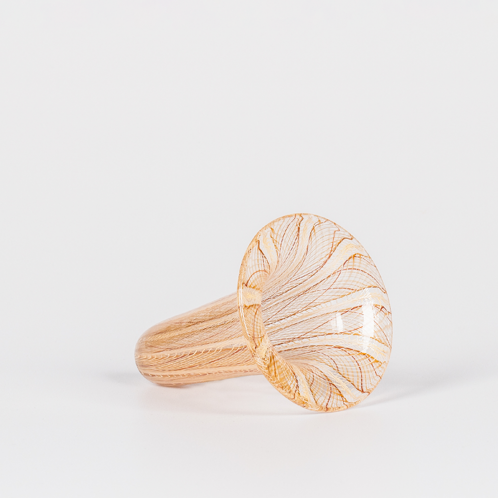 Miniature glass sculpture of an eel trap with intricate brown swirl design