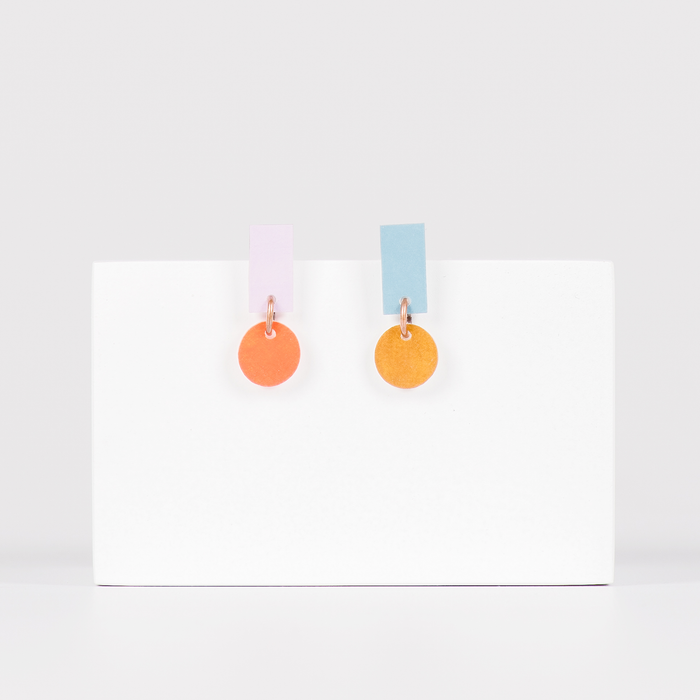colourful stud earrings featuring small circle charm 