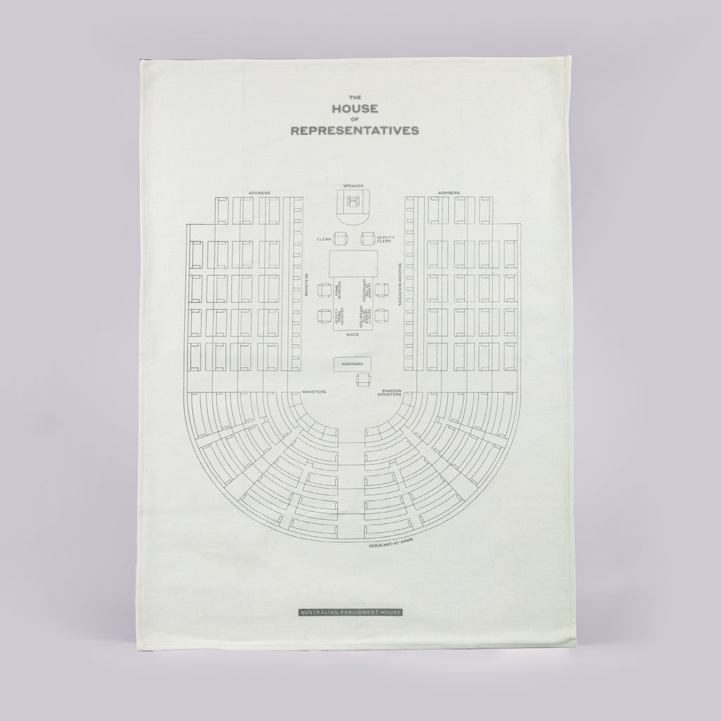 front of green tea towel featuring a House of Representatives Chamber seating plan.