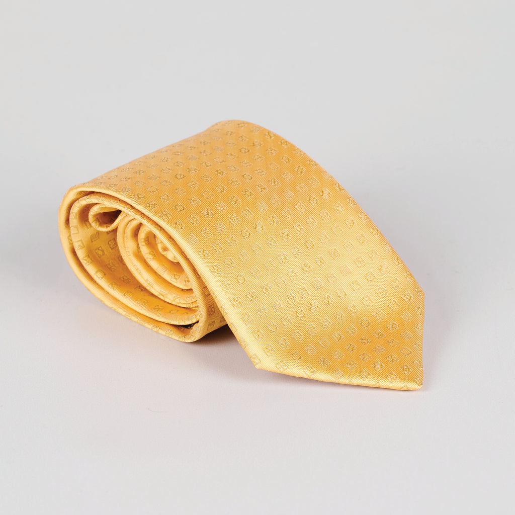 rolled gold tie featuring small square pattern
