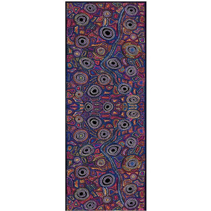 flatlay of purple scarf with traditional patterns