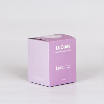 Purple candle box with the words 'Lucian handmade soy candle lavender' on the front.