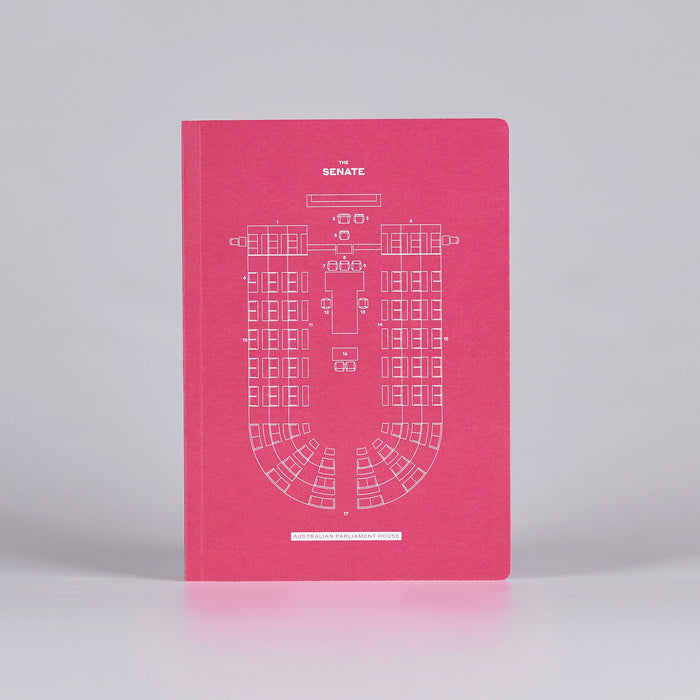 Front cover of a red notebook with a Senate Chamber seating plan.