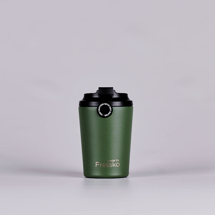 Green reusable coffee cup text reading 'made by Fressko'.
