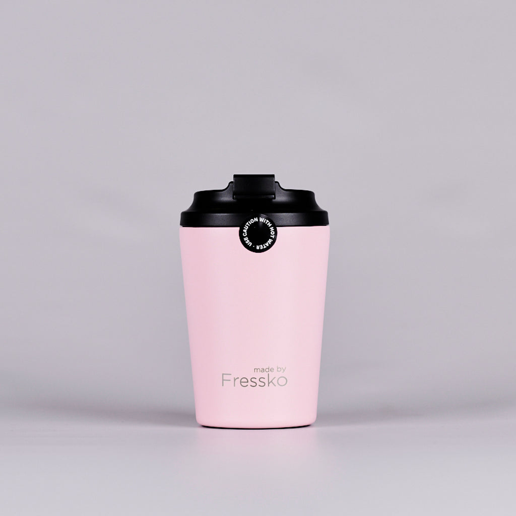 Pink reusable coffee cup text reading 'made by Fressko'.