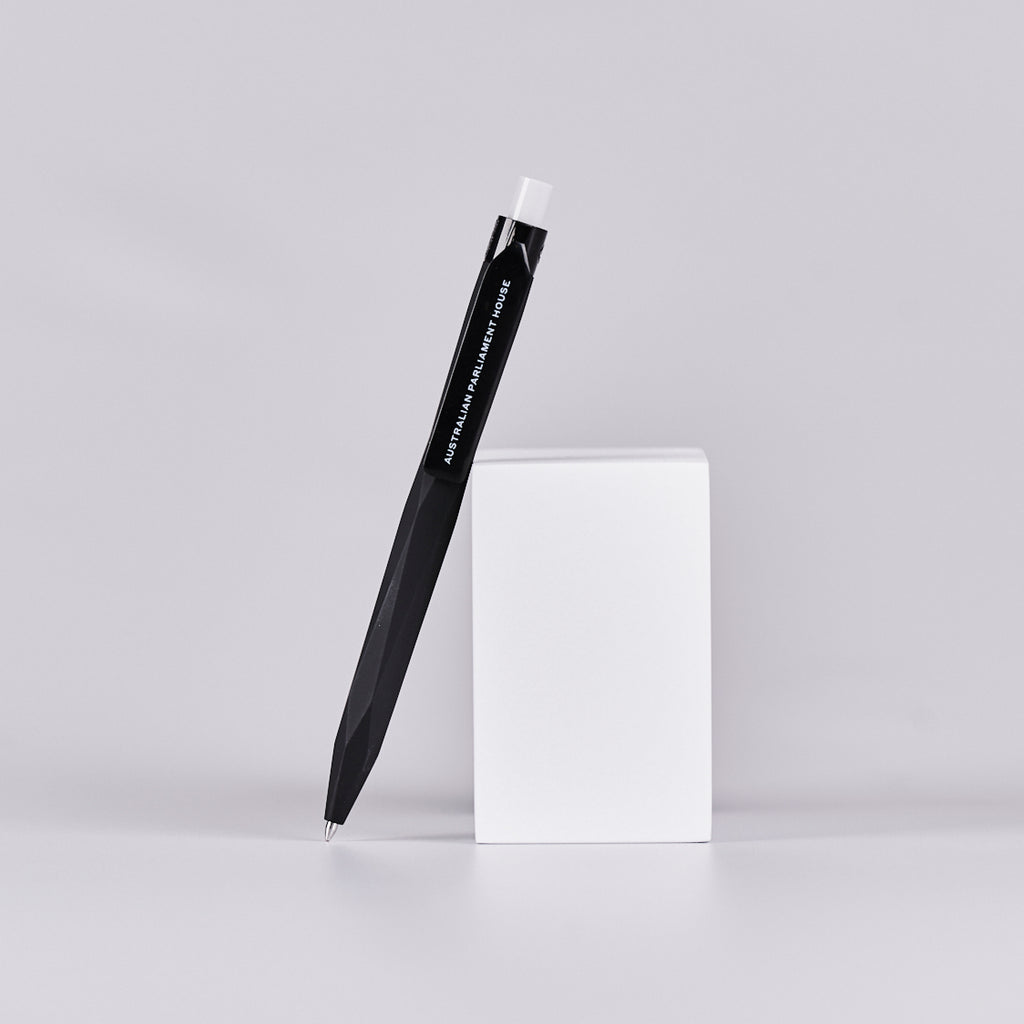 Black pen with text reading 'Australian Parliament House' printed on it. 