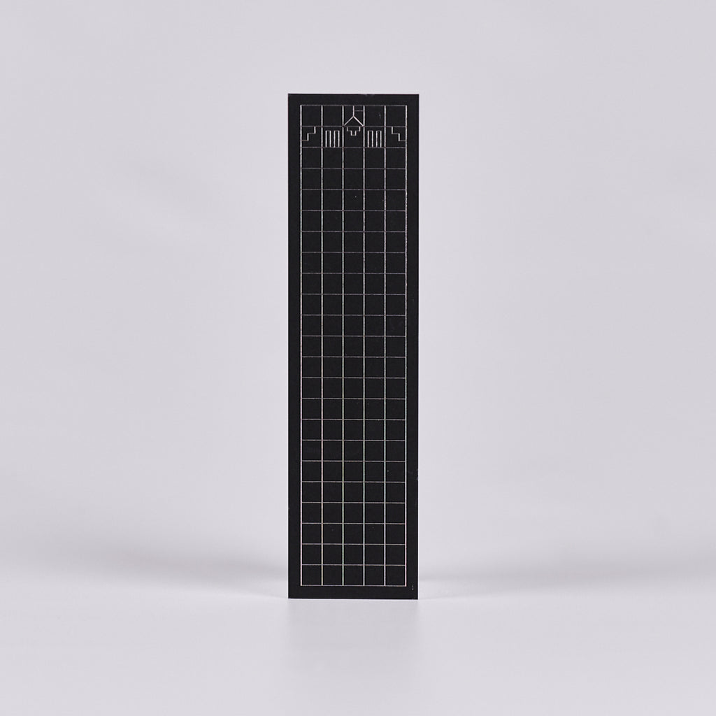 Black bookmark with a geometric grid and logo in the shape of Parliament House. 