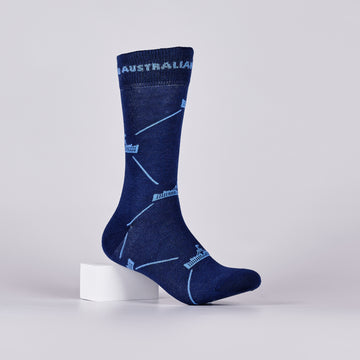 Navy sock with repeated, light blue Parliament House logos on a foot mannequin. 